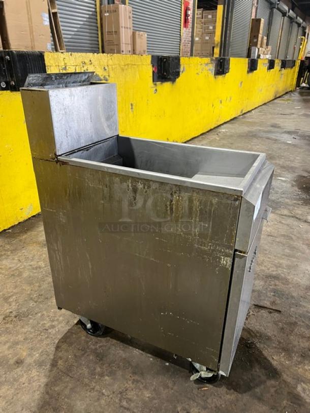 Asber stainless steel 40/50 lb. deep fat fryer, model AEF-4050-S-E-NG. Natural gas powered, with back splash, on casters.