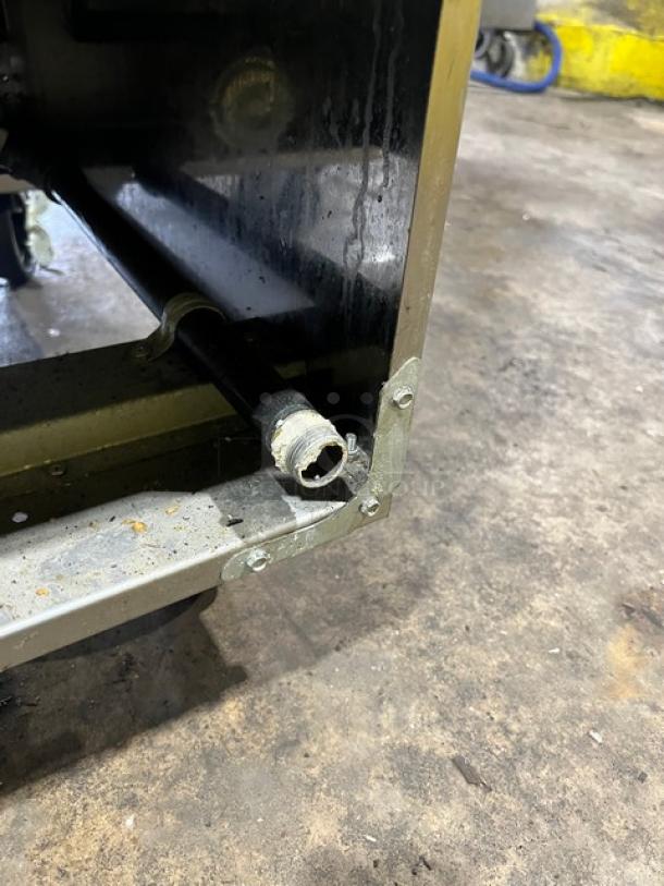 Asber commercial stainless steel deep fat fryer, Model AEF4050SENG, shows caster mounting and connection detail.