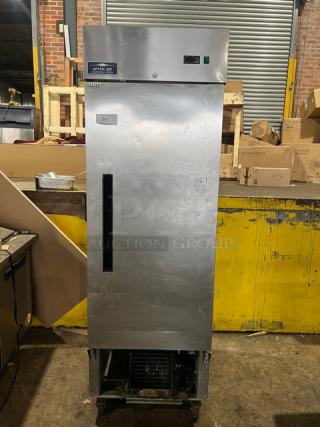 Arctic Air AF23 stainless steel single door freezer, with poly coated rack, on casters, 115V, serial number 6092726.