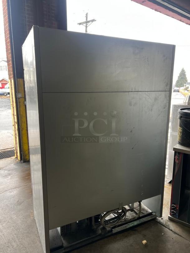 Beverage-Air KF48-1AS commercial stainless steel 2-door reach-in freezer. Energy Star certified, poly-coated wired rack, used.