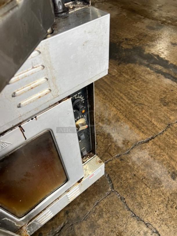 Patriot FMCOF54NG stainless steel double convection oven, natural gas, thermostatic controls, on casters, used condition.