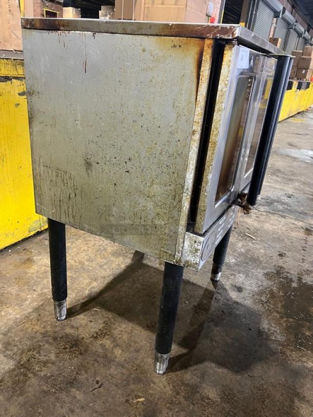 Cpg commercial stainless steel gas convection oven on legs, with thermostatic controls and wired oven rack. Used condition.