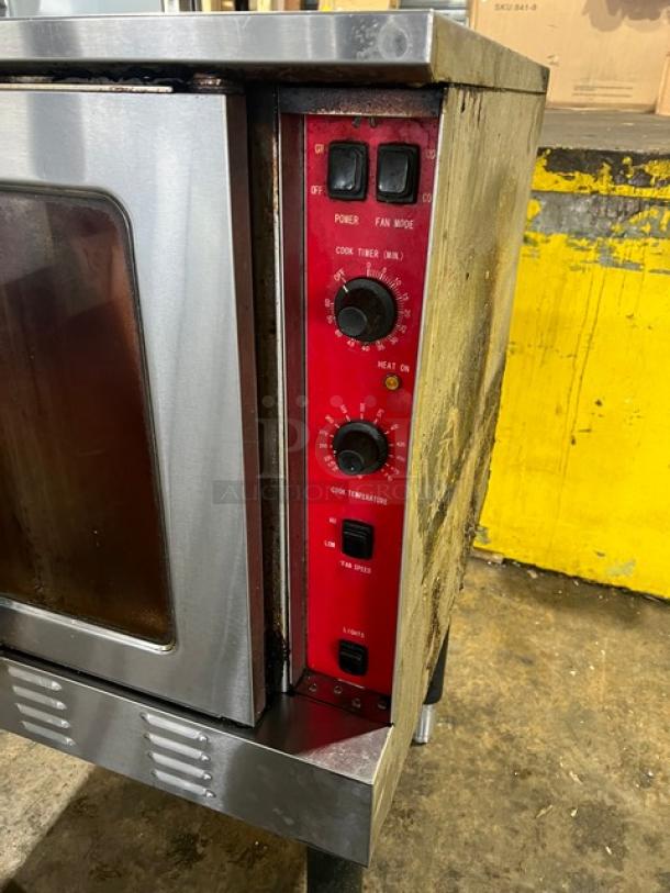 Cpg Commercial Stainless Steel Gas Convection Oven with thermostatic controls, single stack, wired oven rack, on legs.