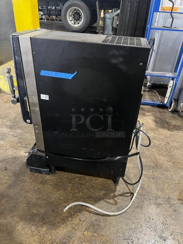 Bunn Nitron CT-BASE black commercial coffee dispenser with dual nitro and cold brew chrome dispensers; 120V, on legs.