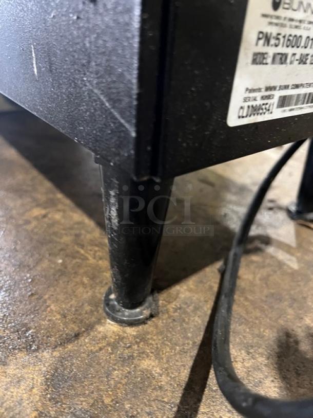 Bunn Nitron coffee dispenser on legs, model NITRONCTBASE, with label showing SN: CLDD005541. 120V, 1 phase power.