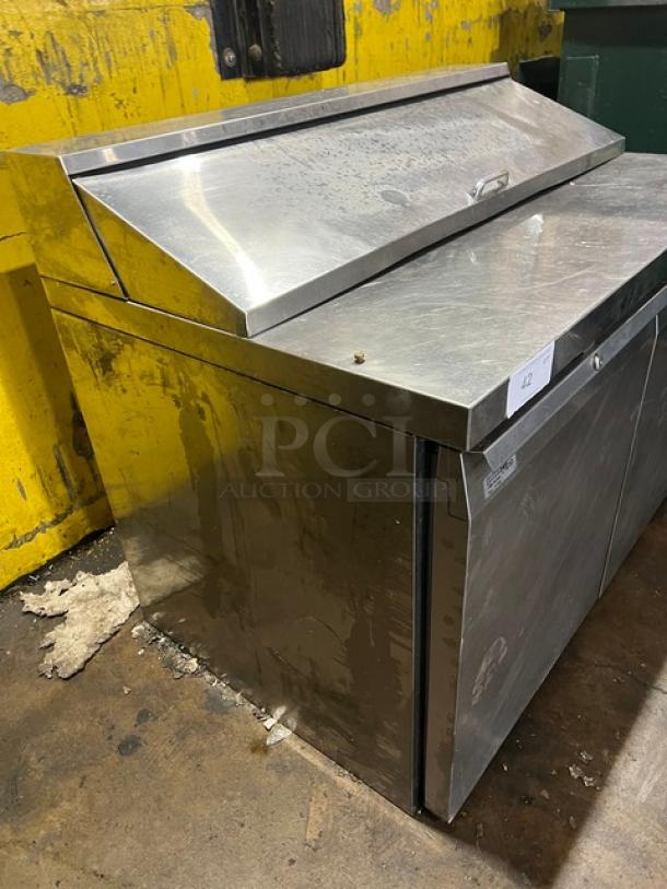 Continental 2-door stainless steel refrigerated prep table, Bain Marie style, 115V, on legs. Used condition.