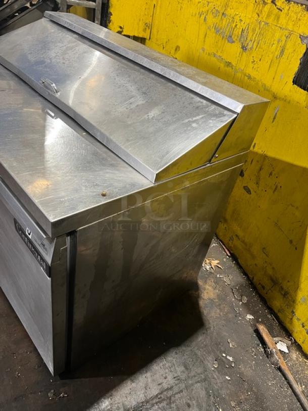 Continental stainless steel 2-door refrigerated Bain Marie style salad/sandwich prep table, 115V, on legs, fair condition.