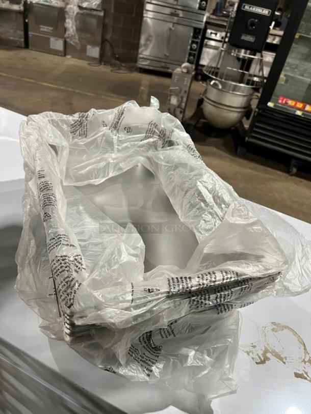 Winco SPJL104 stainless steel steamtable pan, full-size, 4" deep, anti-jam, wrapped in plastic. New condition.