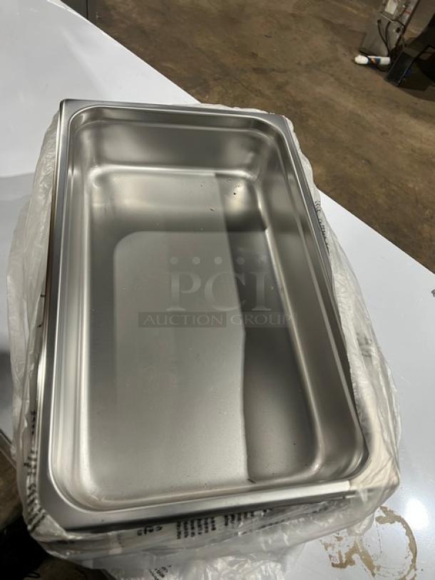 Winco SPJL104 stainless steel 4" deep anti-jam hotel pan, full-size, new condition, ideal for commerical steam tables.