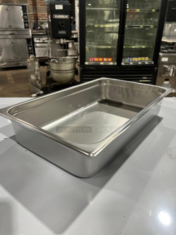 Winco commercial stainless steel steamtable pan, full-size, 4" deep, model SPJL104, new condition, anti-jam design.