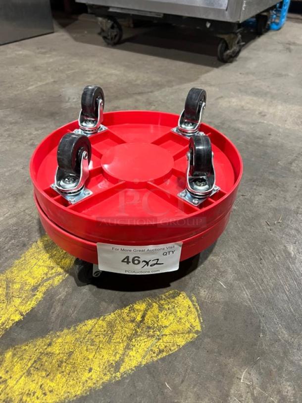New commercial red round multi-purpose dolly, featuring four swivel casters. Label indicates auction lot number 46.