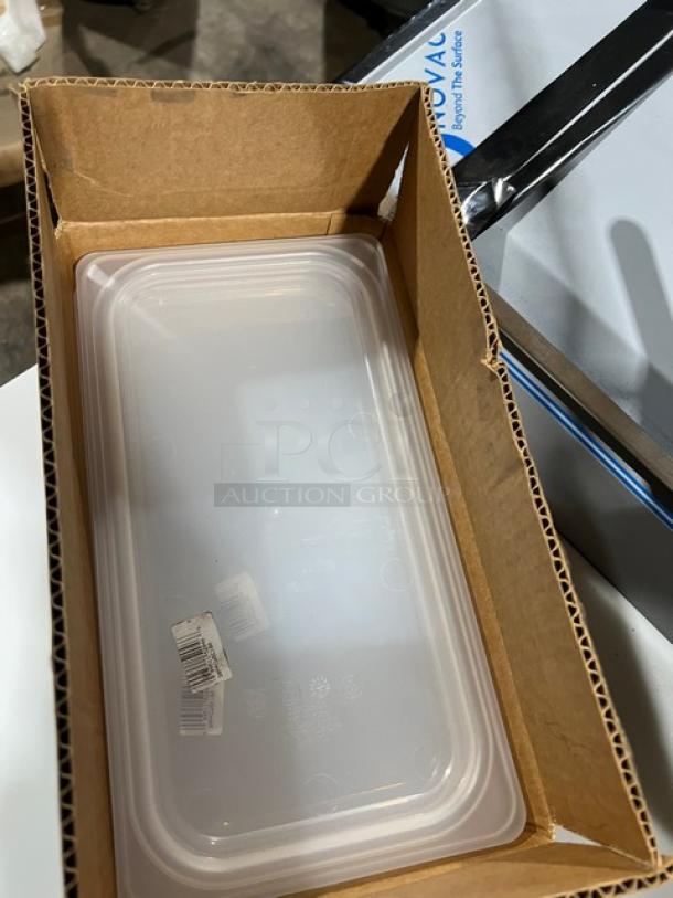 New Cambro translucent 1/3-size pan seal lid, model 30PPCWSC190, in original packaging. Tags indicate commercial use.