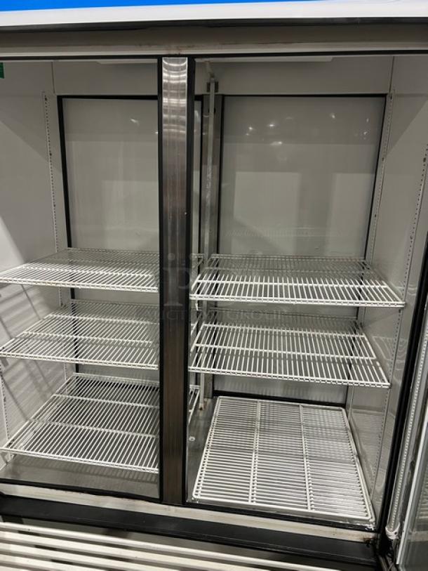 True GDM-49RL Commercial Refrigerator, double glass swing doors, poly coated wired racks, excellent condition, 115V.