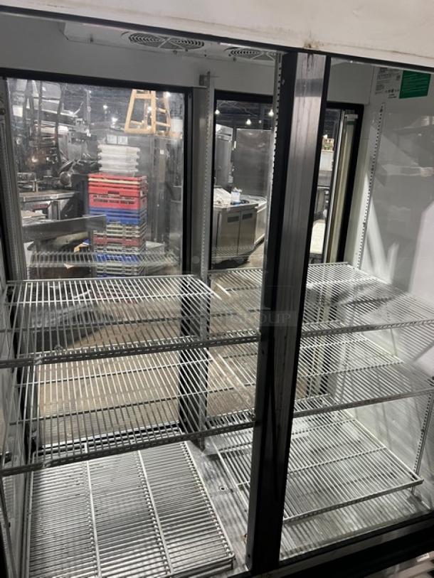 True GDM-49RL Commercial Double Glass Swing Door Refrigerator with poly-coated wire rack, good condition, SN: 1-3484604.