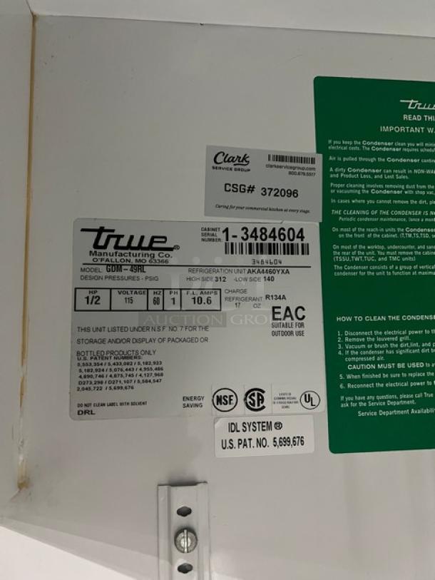 True GDM-49RL merchandiser refrigerator, black & white, double glass swing doors, poly-coated rack, SN: 1-3484604, 115V 1 phase.