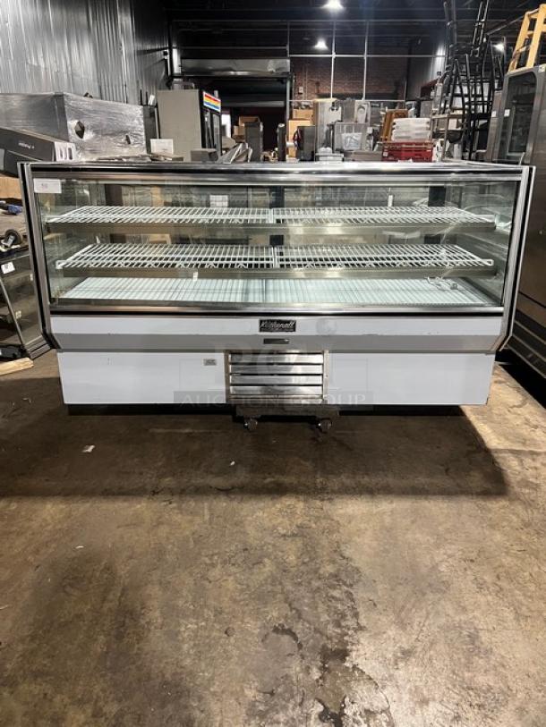 Leader NCBK77 stainless steel bakery display case with straight glass, 2-tier wire rack, and rear sliding doors. 115V, 1-phase.