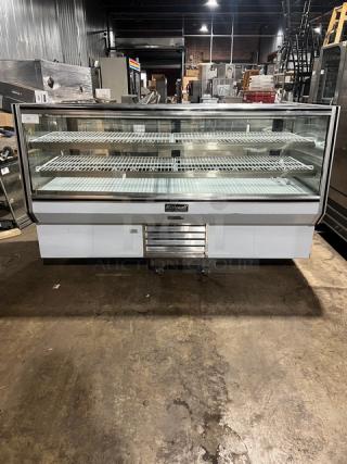 Leader NCBK77 stainless steel bakery display case with straight glass, 2-tier wire rack, and rear sliding doors. 115V, 1-phase.