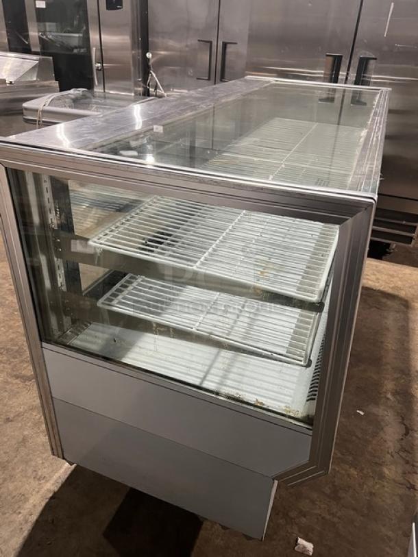 Leader Commercial Stainless Steel 2-Tier Bakery Display Case, Model NCBK77, with glass sliding doors and poly-coated racks.