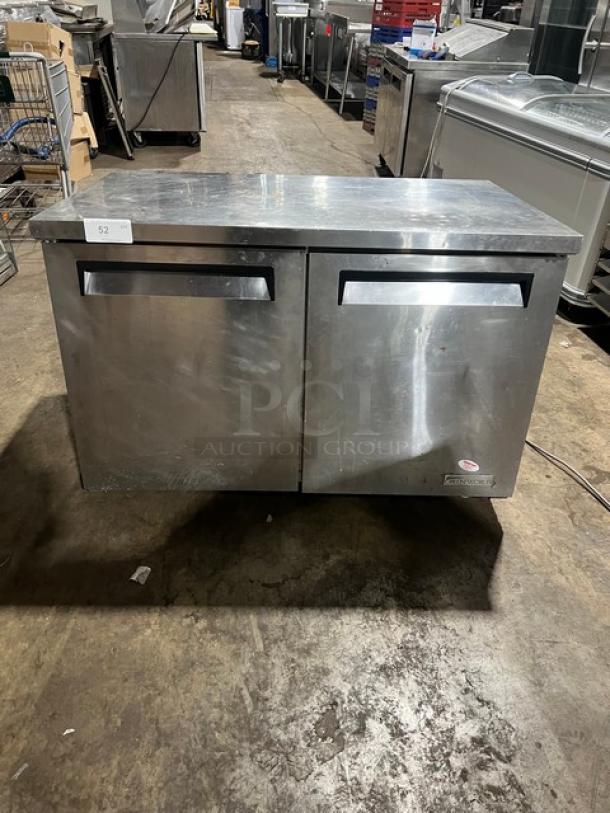 Green World stainless steel 2-door undercounter refrigerator, model GUC-48DR, with poly-coated wired rack, on casters.