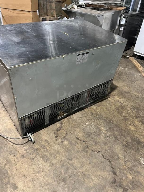 Green World stainless steel 2-door refrigerator model GUC-48DR, with casters, poly-coated rack, 115V 1 Phase.