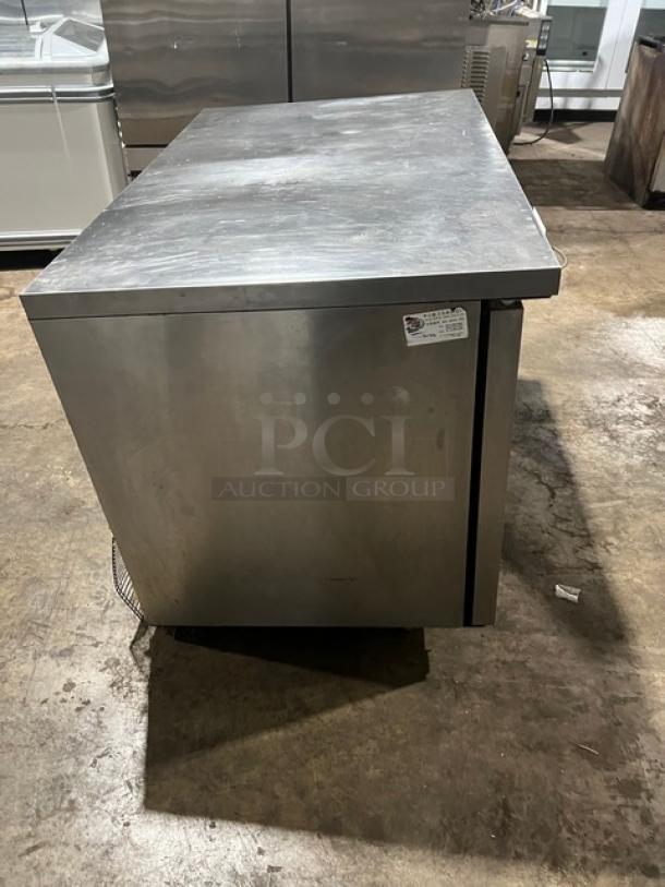 Green World GUC-48DR stainless steel 2-door undercounter refrigerator with poly-coated wire rack, on casters, 115V 1 Phase.