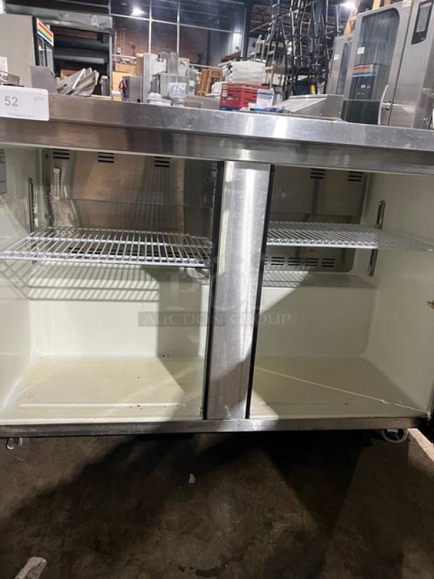 Green World GUC-48DR stainless steel 2-door undercounter refrigerator, poly-coated wire rack, on casters, model SN: WUR4911004.