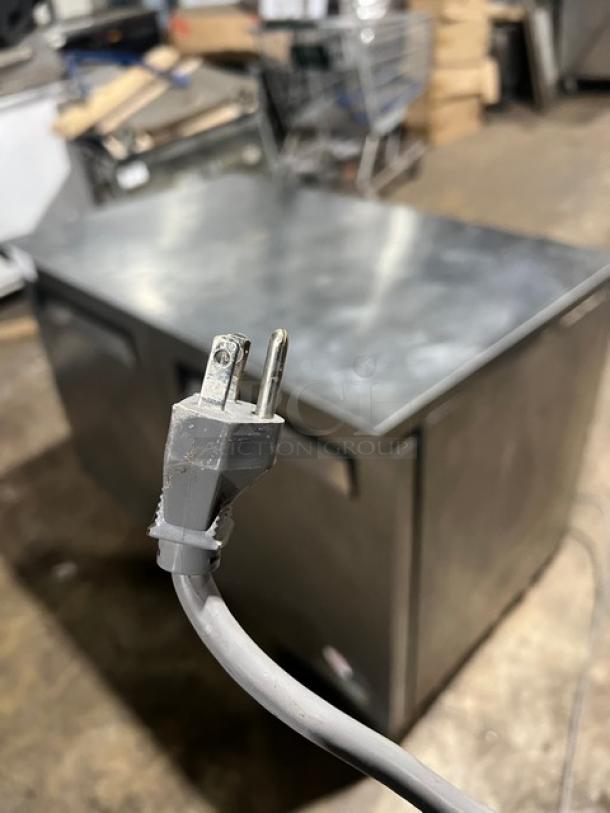 Green World stainless steel 2-door undercounter refrigerator, model GUC-48DR, with poly-coated rack, on casters. 115V plug.