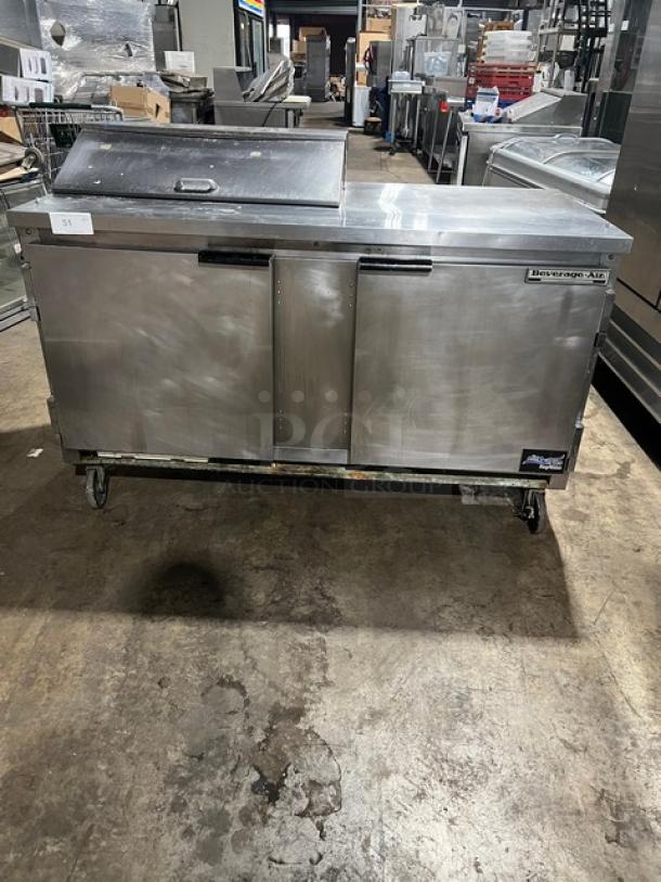 Beverage-Air SPE60-08 stainless steel 2-door refrigerated prep table, bain marie style, with poly coated rack, on casters.