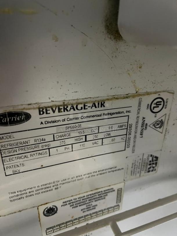 Beverage-Air refrigerated prep table model SPE60-08 label, showing specifications like refrigerant type R134a and electrical ratings.