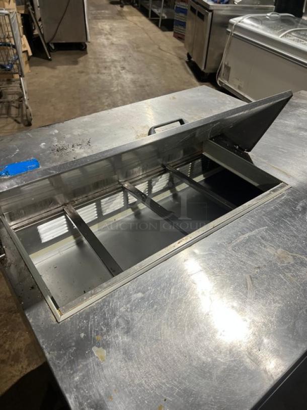 Beverage-Air SPE60-08 stainless steel 2-door refrigerated prep table, bain marie style, with poly-coated rack, on casters.