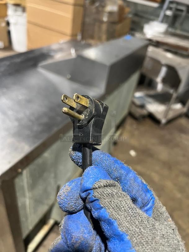 Beverage-Air SPE60-08 prep table, stainless steel, two-door, refrigerated, with poly-coated rack, on casters, 115V plug shown.