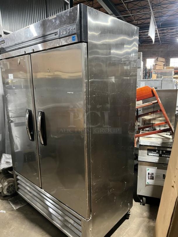 Masterbilt Fusion Series stainless steel 2-door reach-in freezer, Model F49S, serial 14110103, with poly-coated racks, on commercial casters.