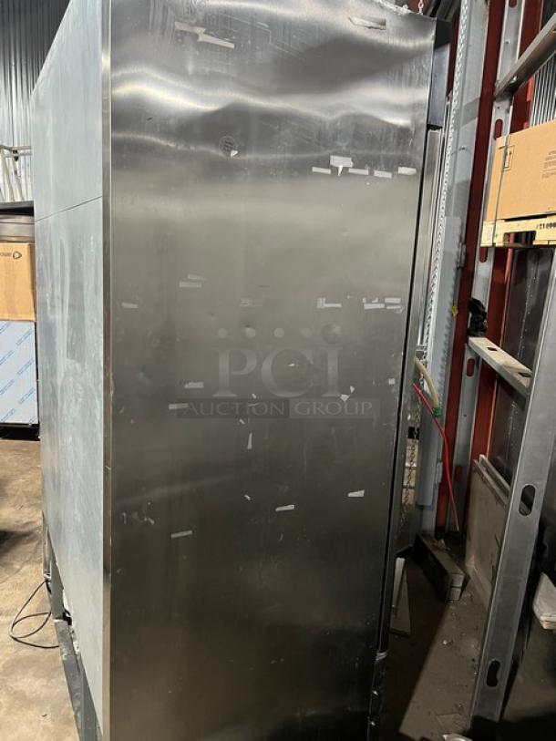 Masterbilt Fusion Series 2-door reach-in freezer F49S in stainless steel with poly-coated racks and commercial casters.