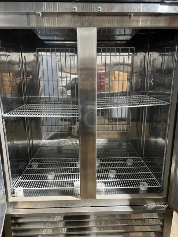 Masterbilt F49S Fusion Series 2 Door Stainless Steel Reach-In Freezer, poly coated racks, on commercial casters.