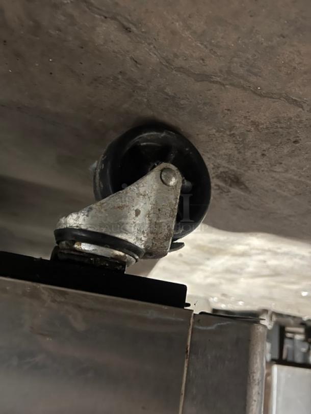 Masterbilt Fusion Series F49S freezer caster, showing stainless steel, 2-door design, and durability feature.