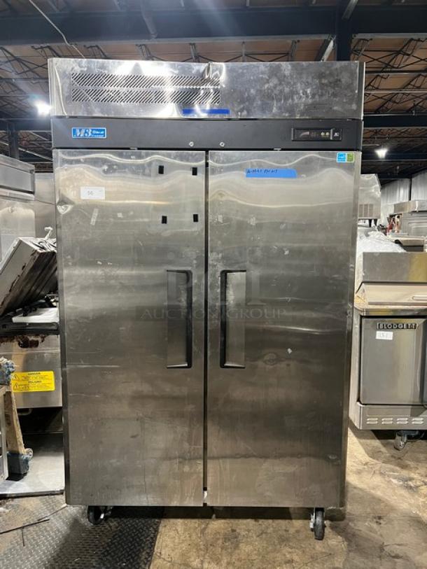 Turbo Air M3F47-2 stainless steel, 2-door reach-in freezer on commercial casters, model and serial labels visible.