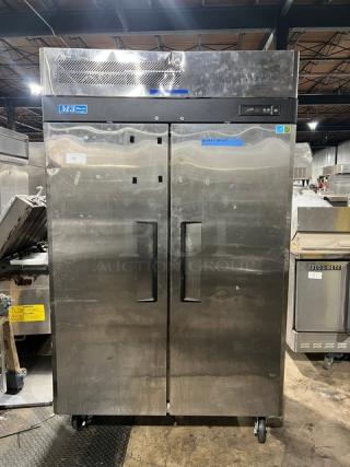 Turbo Air M3F47-2 stainless steel, 2-door reach-in freezer on commercial casters, model and serial labels visible.