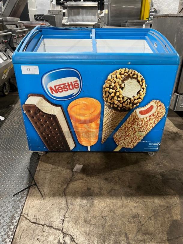 AHT RIO S100 reach down freezer merchandiser, 120V, 1 phase, vibrant ice cream graphics, serial 60060100000925.