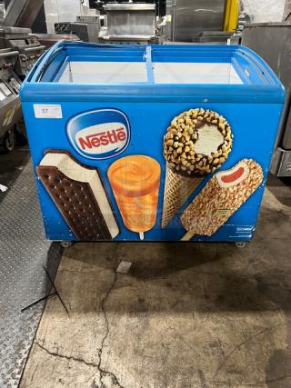 AHT RIO S100 reach down freezer merchandiser, 120V, 1 phase, vibrant ice cream graphics, serial 60060100000925.