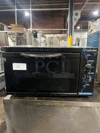 Moffat Turbo Fan E25 countertop electric convection oven, black, controls visible, model E25, serial 234997, 120V 1 Phase.
