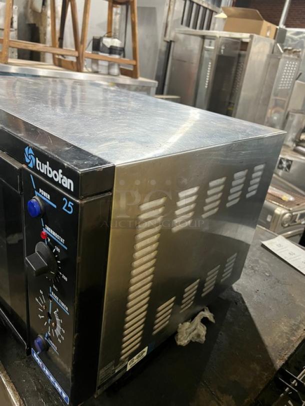 Moffat Turbo Fan Model E25 countertop convection oven, electric powered, 120V, with control knobs and "turbofan" label.