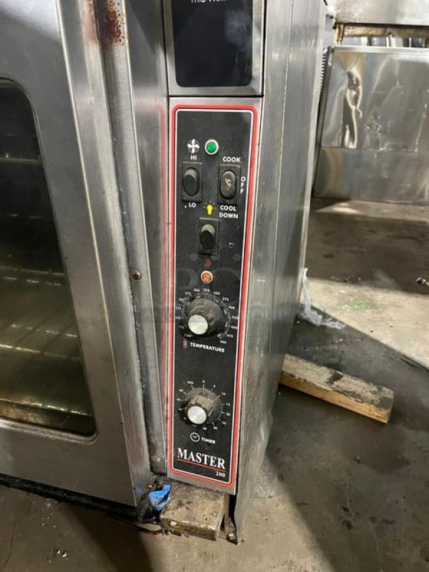 Garland Master Series 200 gas convection oven, model Master 200, control panel with temperature and timer knobs, used condition.