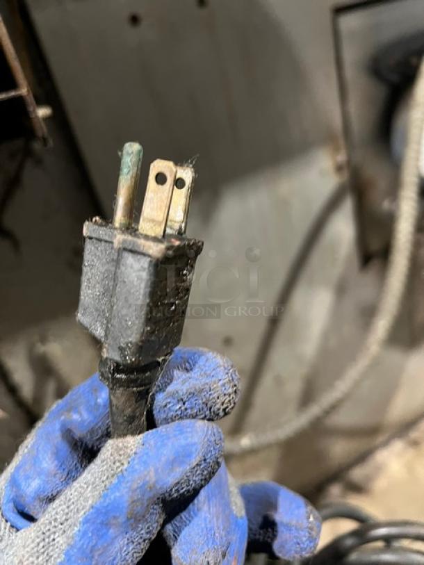 Dirty power plug of Garland Master Series 200 gas convection oven, worn condition.