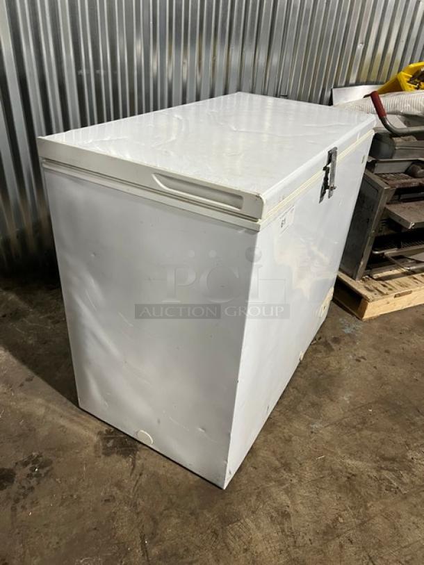 GE White Deep Chest Freezer, Model FCM7SUBWW, Serial GS101196, 115V, 1 Phase, in utilized condition.