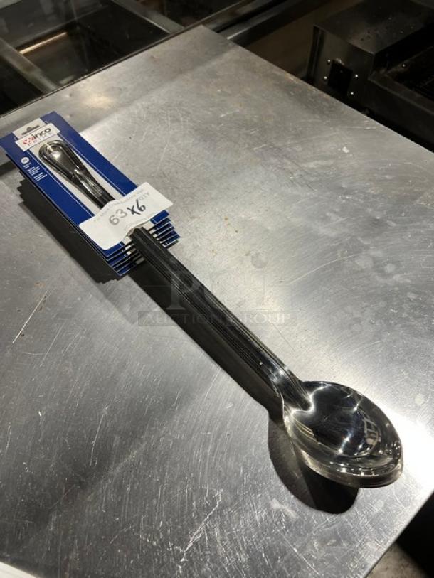 Brand new Winco Prime BSON-21 stainless steel basting spoon on display. Packaged, with original labeling and model indication.