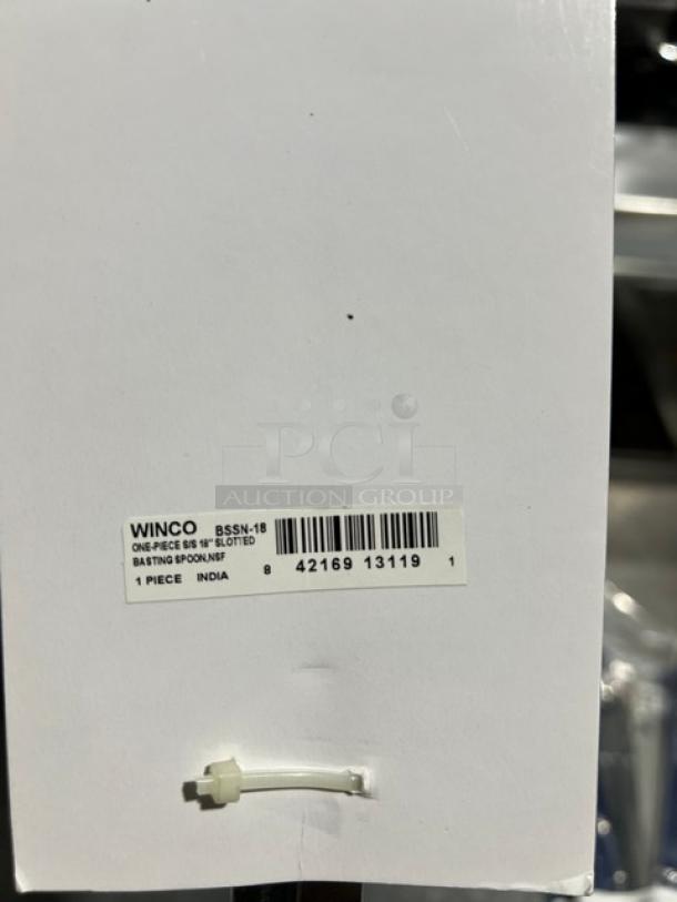 Brand new Winco Prime stainless steel slotted basting spoon, model BSSN-21, in packaging with barcode and origin label.