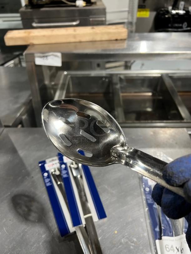 Winco Prime Stainless Steel Slotted Basting Spoon, Model BSSN-21, brand new. Six spoons visible in packaging.