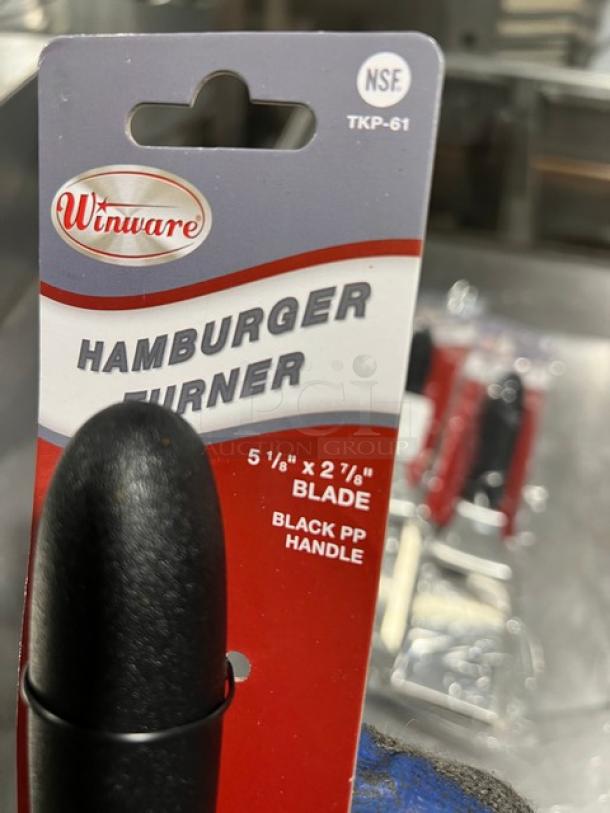Winware Hamburger Turner Model TKP61, new condition, features 5⅛" x 2⅞" blade with black PP handle, NSF certified.