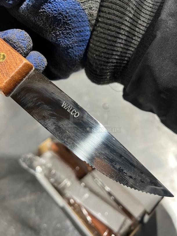 New Walco heavy-duty steak knife in box, wooden handle, serrated blade, visible "WALCO" engraving, set of 12.