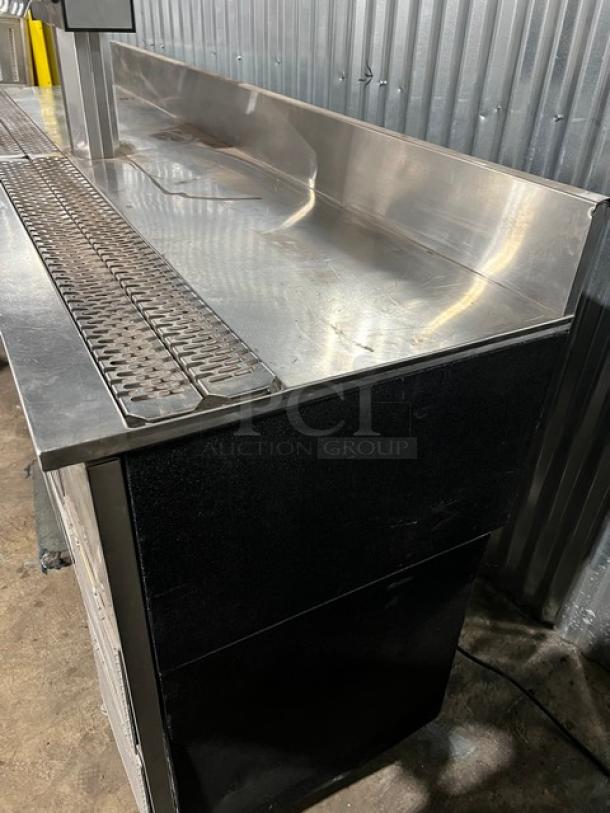 Perlick stainless steel commercial kegerator model KC84-R6-SSH. Features four tap tower, kegerator with drip tray.